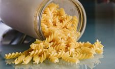 Pasta Was Tipped Out From Glass.Fusili Pasta Stock Photo Pasta Was Tipped Out From Glass.Fusili Pasta Stock Photo