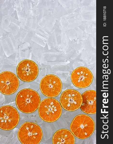 Fresh orange on ice