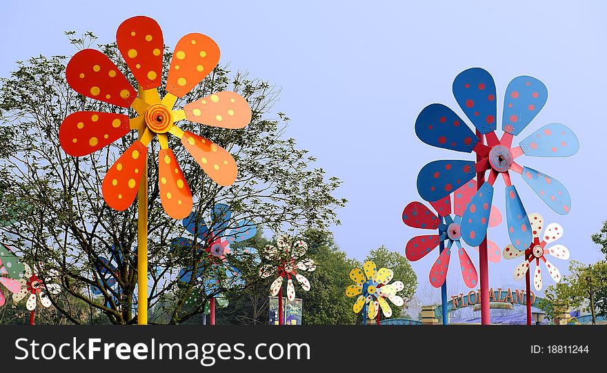 Colorful windmill in amusement park