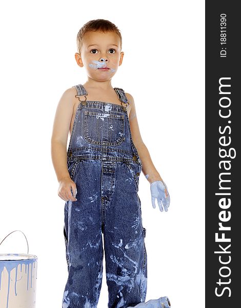 A preschooler innocently covered in blue paint. Isolated on white. A preschooler innocently covered in blue paint. Isolated on white.