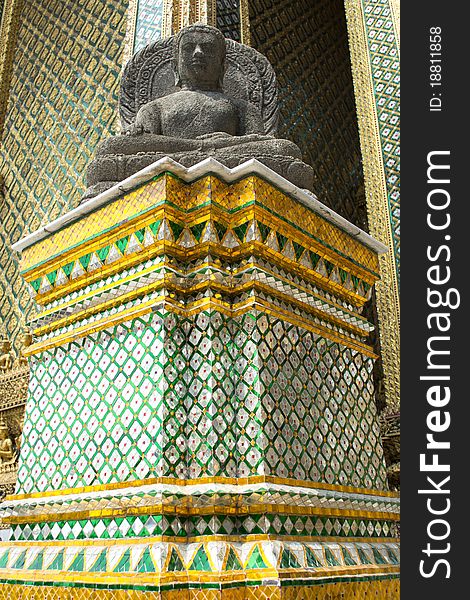 Stone Buddha at Wat Phra Kaew is located in Bangkok, Thailand. Stone Buddha at Wat Phra Kaew is located in Bangkok, Thailand