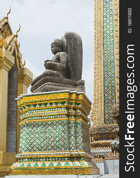 Stone Buddha at Wat Phra Kaew is located in Bangkok, Thailand. Stone Buddha at Wat Phra Kaew is located in Bangkok, Thailand