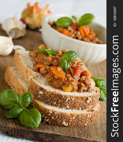 Sandwich of savory ground beef on toasted wholewheat bread. A delicious variety of a Sloppy Joe. Sandwich of savory ground beef on toasted wholewheat bread. A delicious variety of a Sloppy Joe.