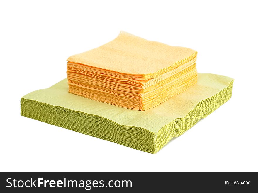 Green and yellow napkins isolated on a white background. Green and yellow napkins isolated on a white background.