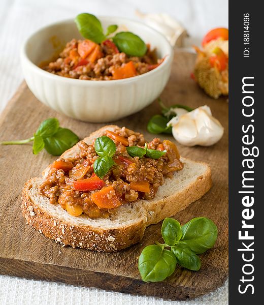 Sandwich of savory ground beef on toasted wholewheat bread. A delicious variety of a Sloppy Joe. Sandwich of savory ground beef on toasted wholewheat bread. A delicious variety of a Sloppy Joe.