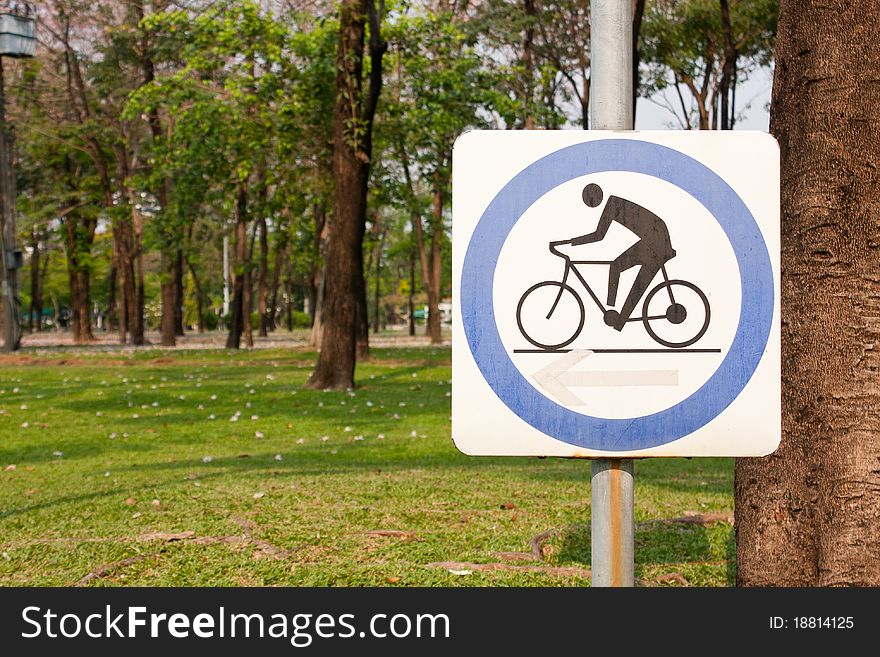 A symbol, people are cycling. On background. A symbol, people are cycling. On background