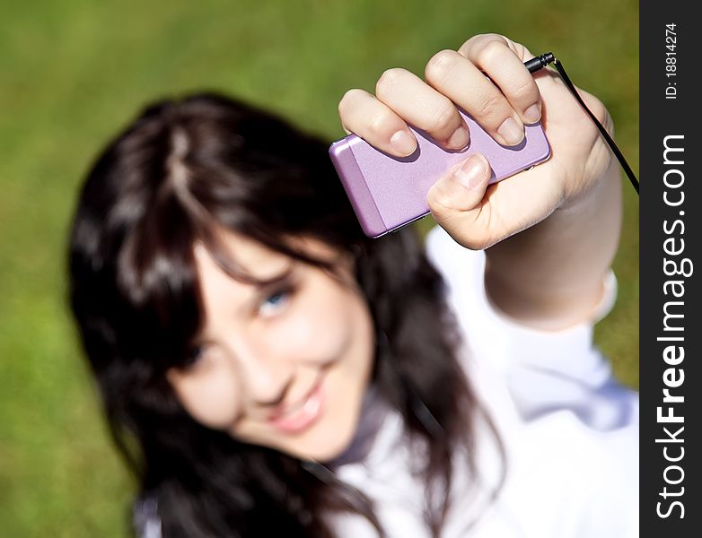 Pretty Young Brunette Girl Listening Music