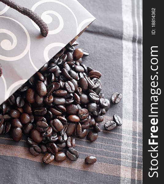 Coffee beans on dark background. Selective focus