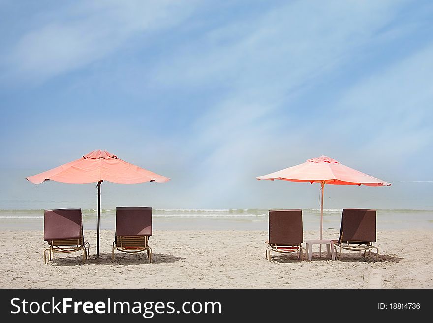 Chairs and umbrella on tropical beach. Chairs and umbrella on tropical beach