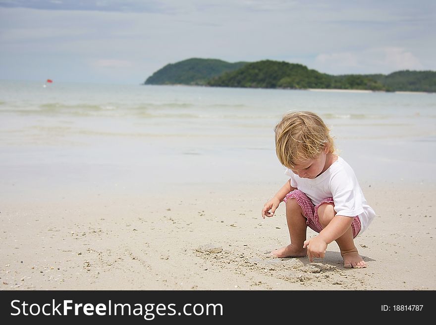 Child playing on beach