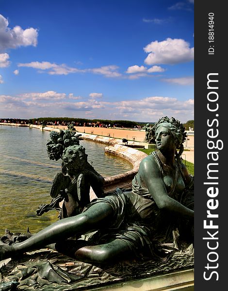 Detail of a sculpture with small lake in the park of the palace. Detail of a sculpture with small lake in the park of the palace