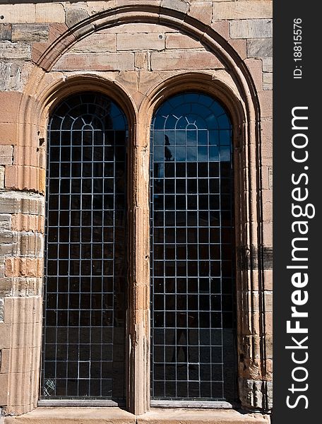 Two tall windows in a castle