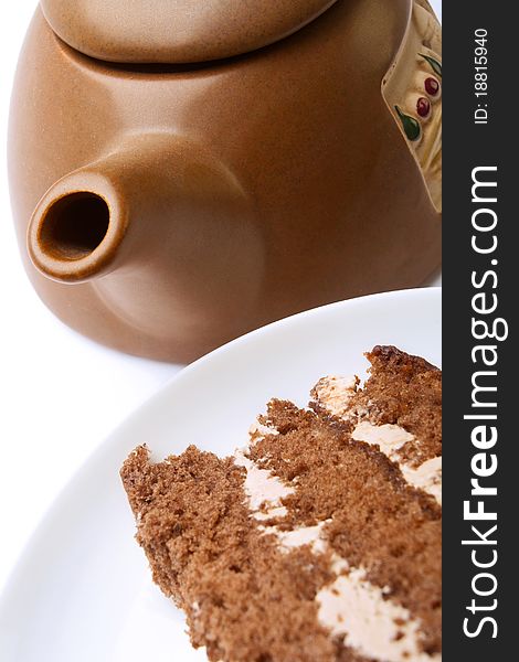 Teapot and cake