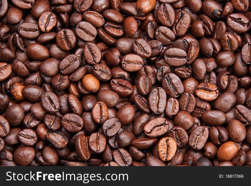 Dark roasted coffee beans texture, overhead, horizontal