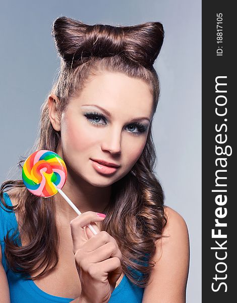 Young woman with sweet lollipop. Young woman with sweet lollipop