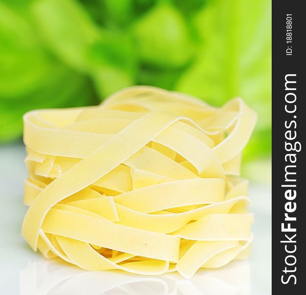 Details of pasta tagliatelle isolated in studio