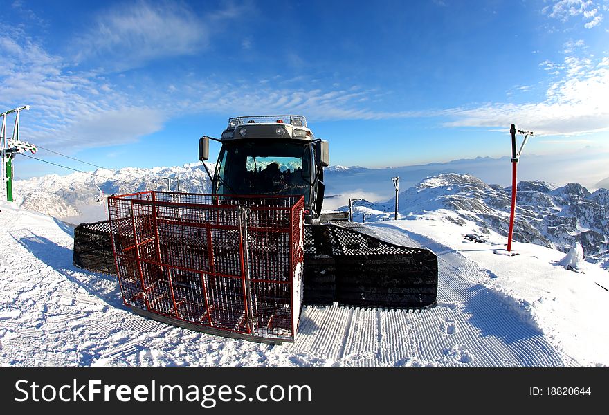 Snow Groomer Vehicle On The Ski Slope