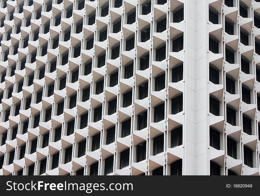 Skyscraper balconies and windows - abstract photo of a classic apartment building