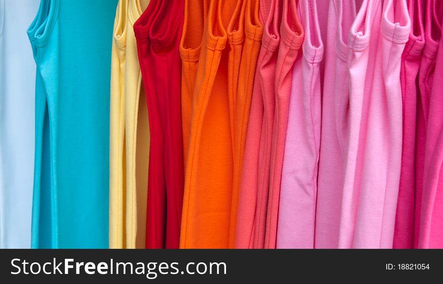 T-shirt hanging in many beautiful colors