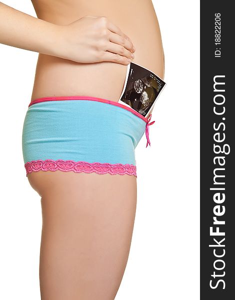 Pregnant belly in pink and blue panties on isolated background