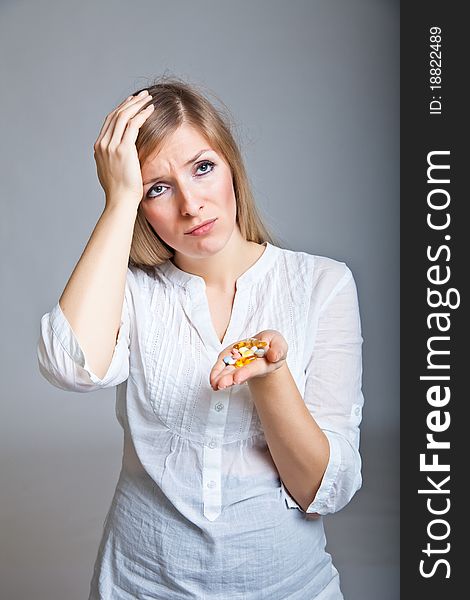 Depressed Woman With Pharmaceutical Pills