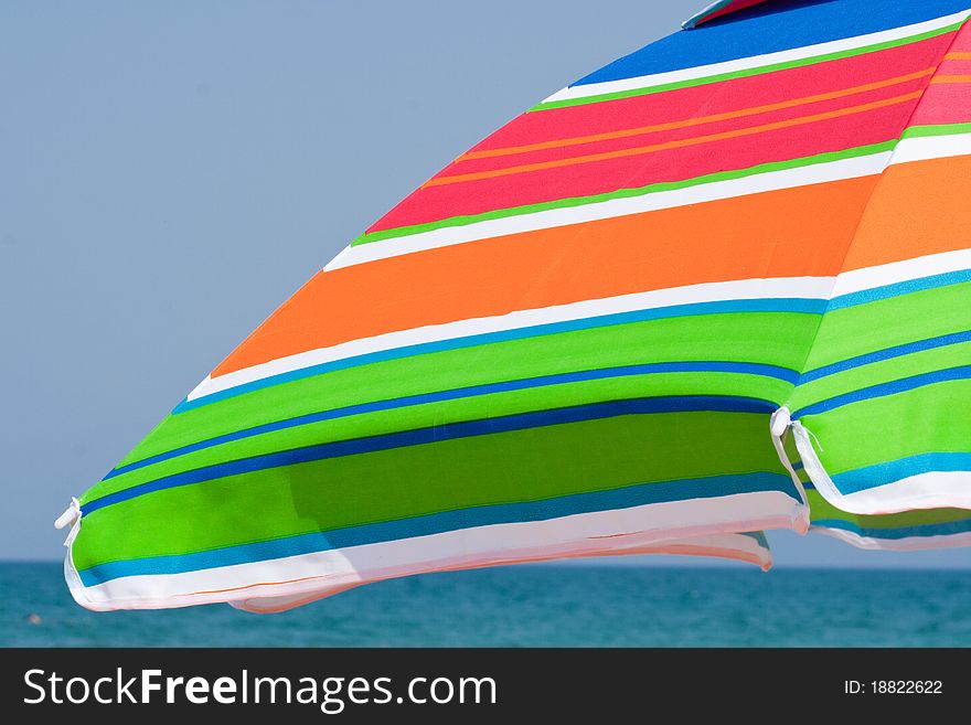 A colorful umbrella in the beach