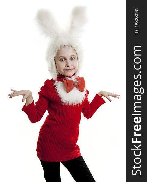 Сhild in a white downy bunny costume. Сhild in a white downy bunny costume.