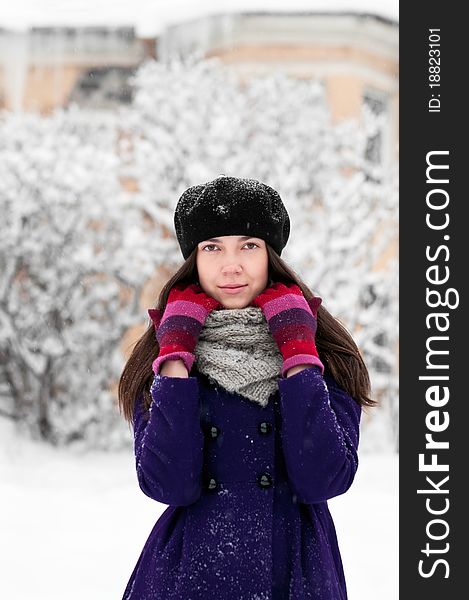 Attractive brunette young woman in winter