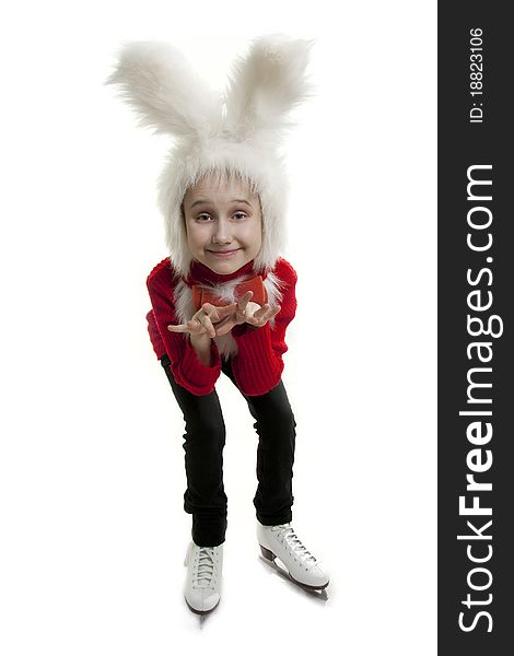 Сhild in a white downy bunny costume. Сhild in a white downy bunny costume.
