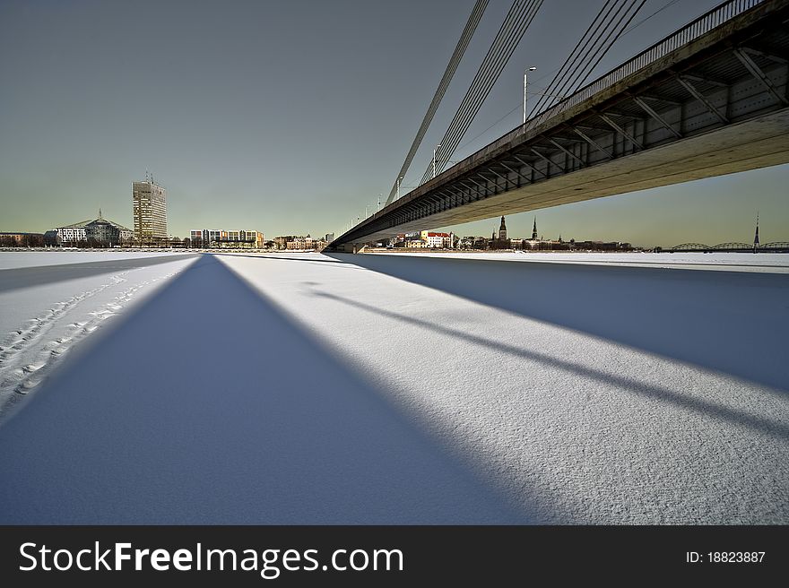 The wide angle view of the bridge over the city Riga.