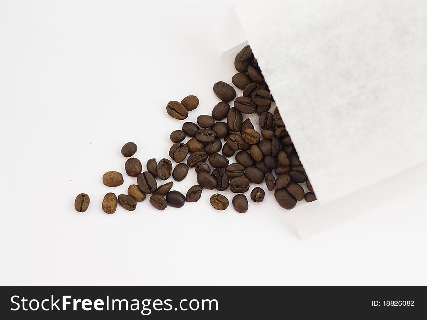 Coffee In The Loose Form Of A White Background