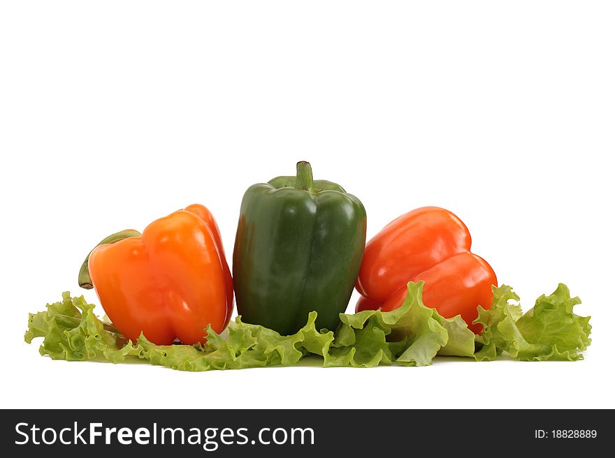 Fresh pepper with lettuce isolated on white. Fresh pepper with lettuce isolated on white