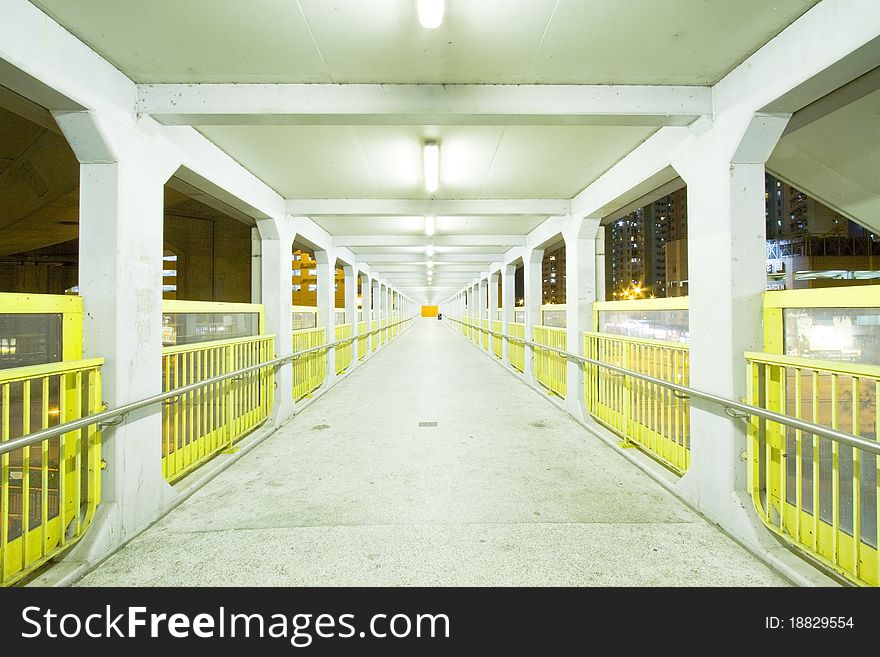 Footbridge with light trails in Hong Kong