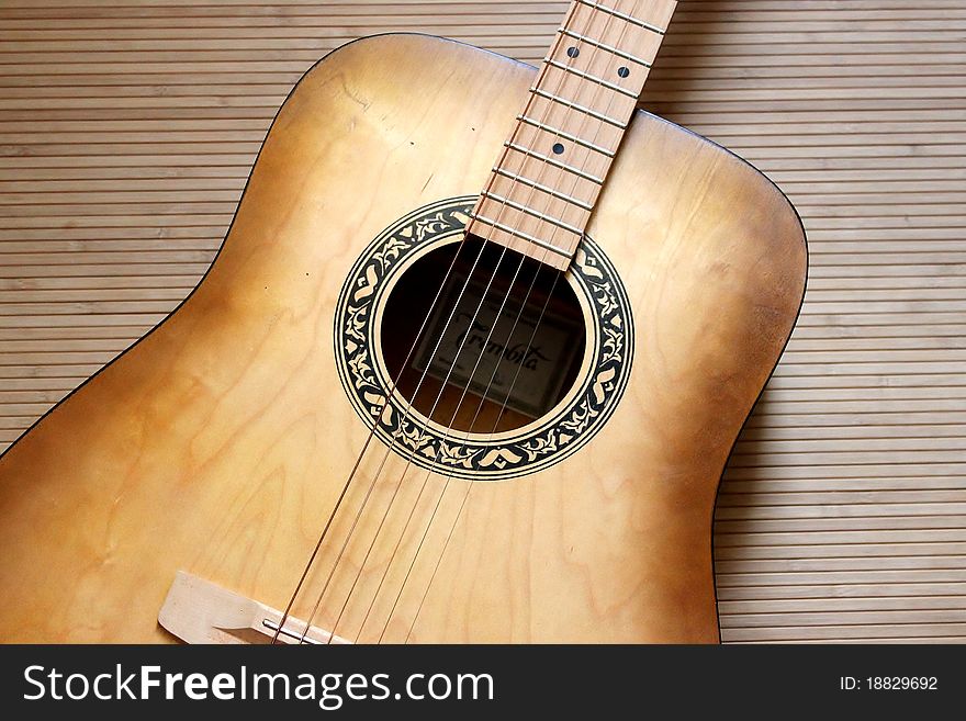 Guitar On A Bamboo Floor