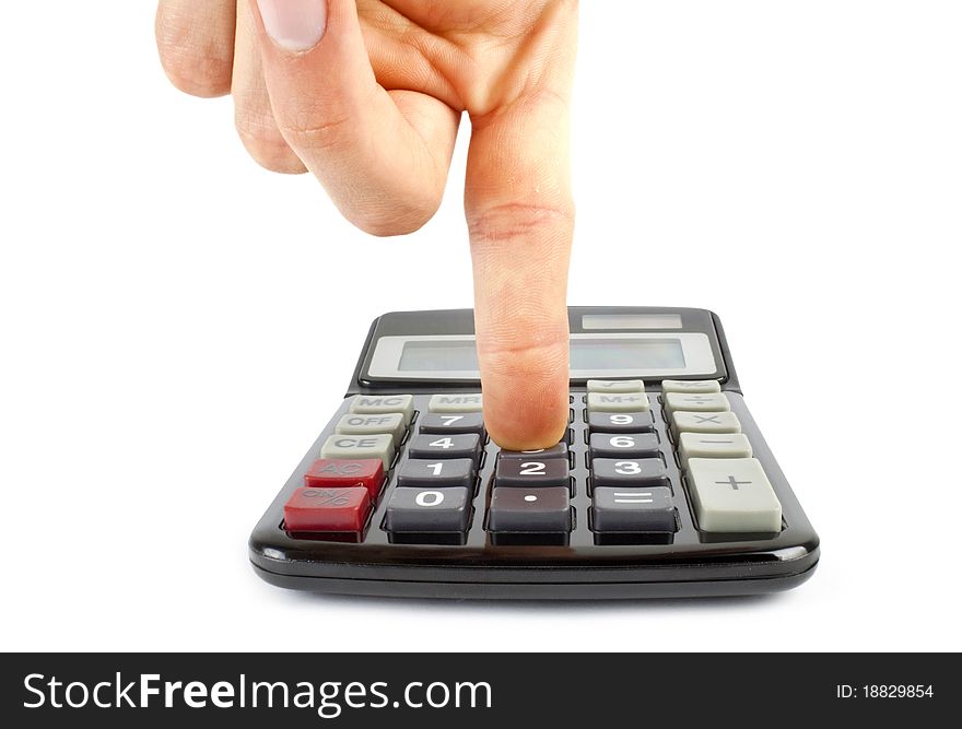 Male's finger pushing button on black calculator