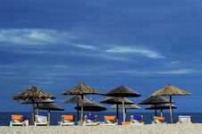 Free Decks And Umbrella On Beach Stock Photography - 18833262