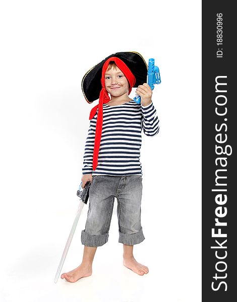 Studio portrait of young boy dressed as pirate