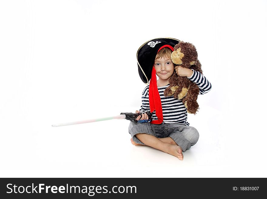 Studio portrait of young boy dressed as pirate