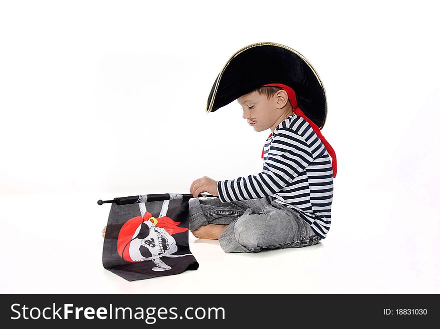 Studio portrait of young boy dressed as pirate