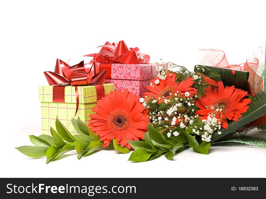 Bouquet gerbera and present boxes