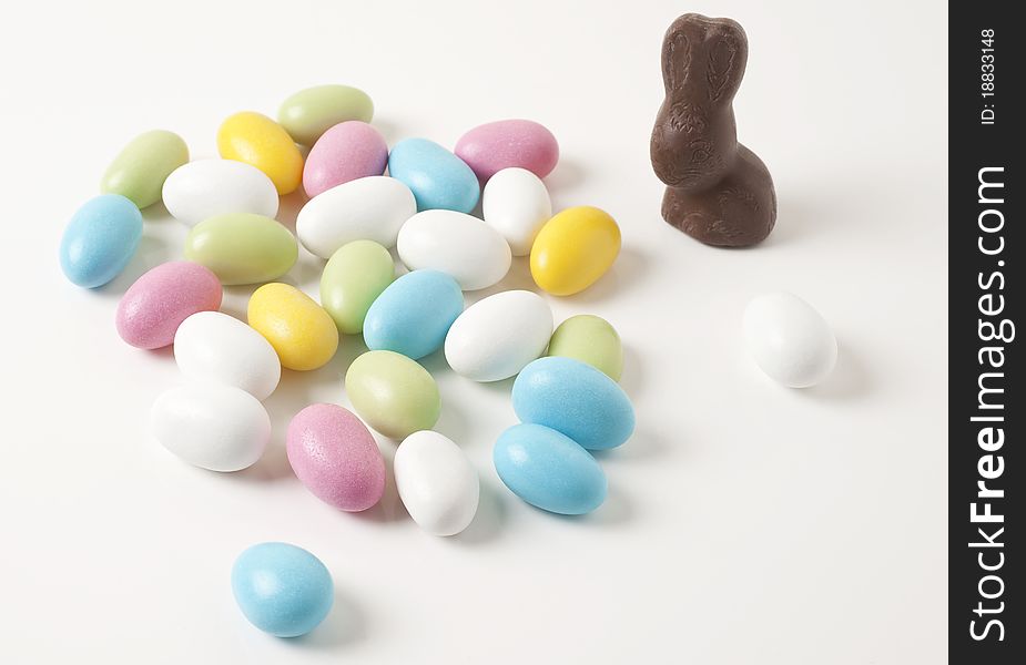 Colorful Easter almonds on white background. Colorful Easter almonds on white background