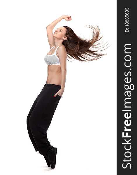 Attractive jumping woman on white