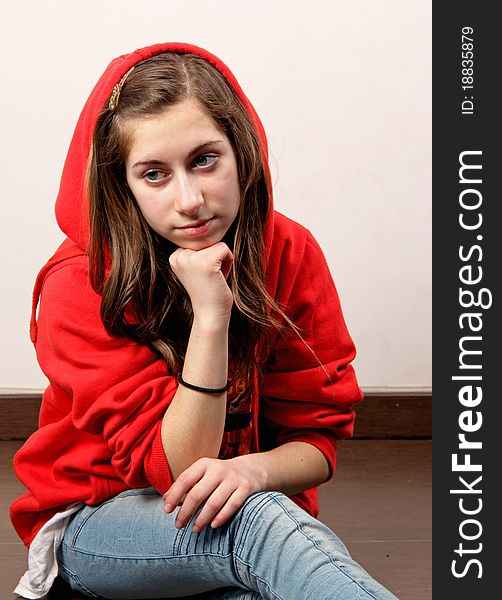 A teen girl in the red