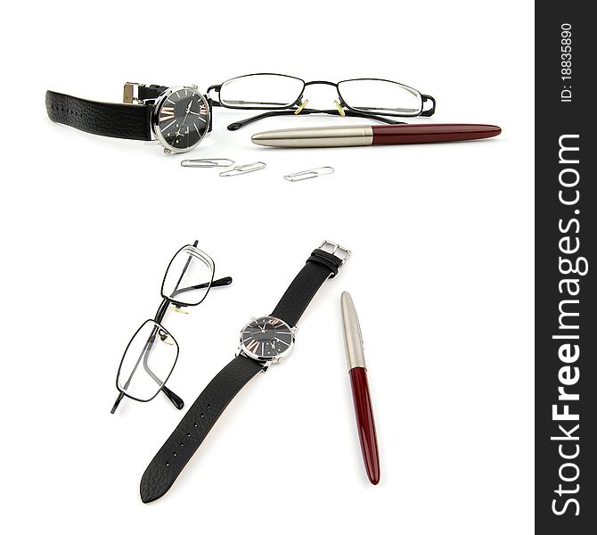 Glasses, pen, watch and paper-clip isolated on white background. Glasses, pen, watch and paper-clip isolated on white background.