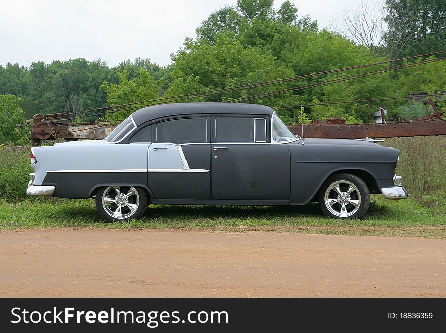 Classic chevy belair parked on the side of the road.