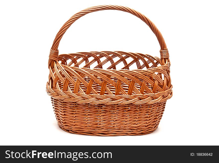 Old wooden basket isolated on white background