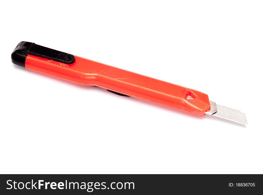 Red box cutter isolated on a white background