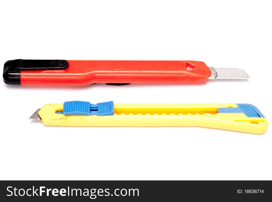 Two box cutters isolated on a white background