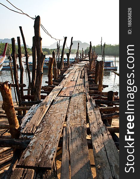 Old Wooden pier at phang nga bay in thailand