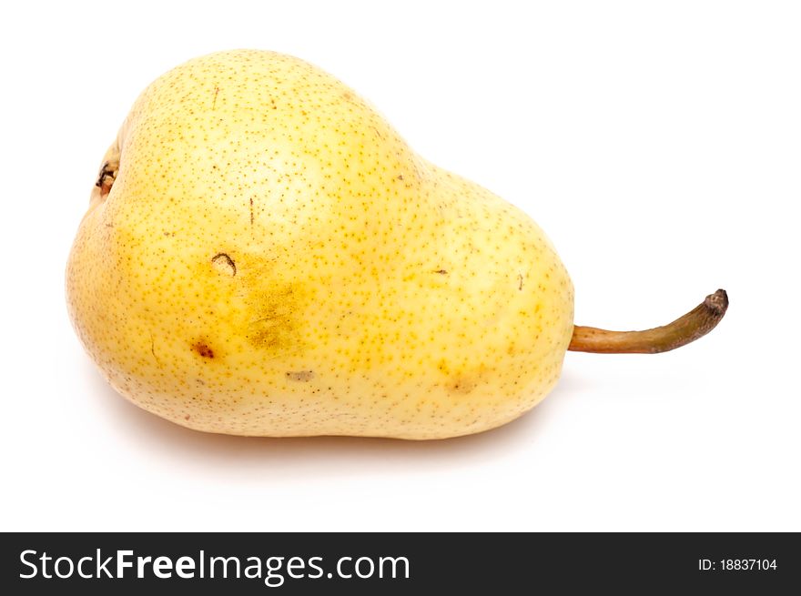 A single yellow pear with over white background